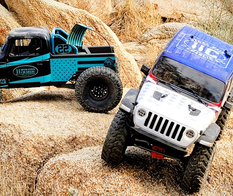 Two O11C RC crawlers on the rocks